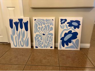 Blue floral canvas art set of 3 20$