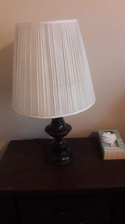 One lamp ( dark brown) in good condition