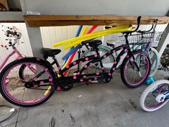 Tandem bike black with pink polka dots