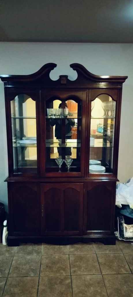 Two-piece China Cabinet unit with glass shelves and storage cubby