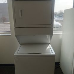 Washer and electric dryer stacker in like new condition with warranty 