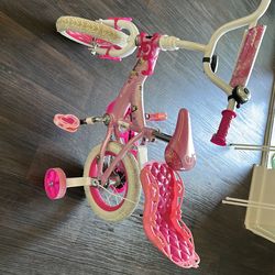 Huffy Princes Bike 12 inch tyres with support wheels