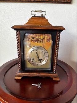 Vintage  German made mantle clock , 10 x 13 inches tall , working ,chiming , key include .