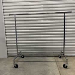 Rolling Metal Clothing rack Adjustable Pre owned
