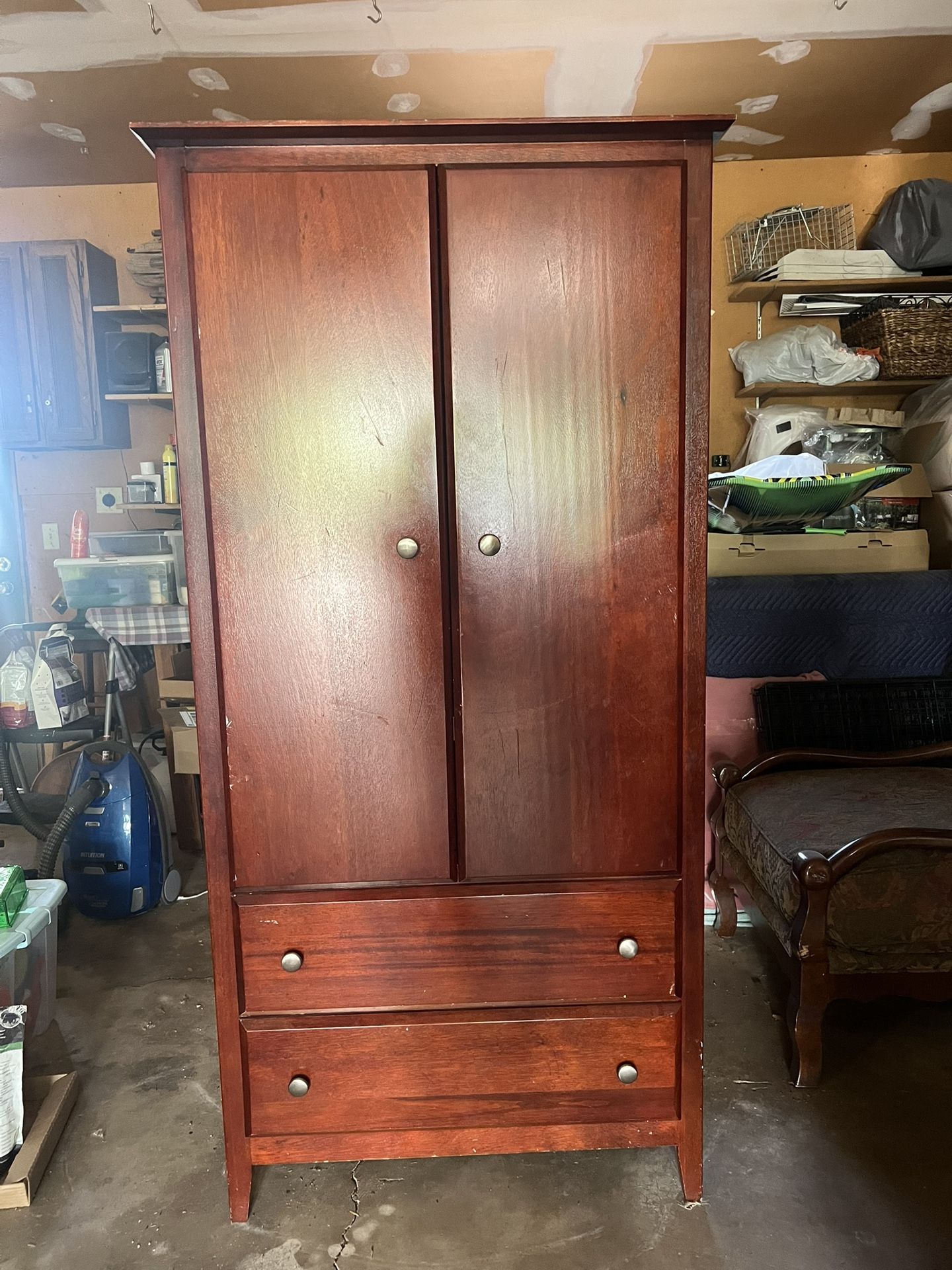 Wooden Armoire With Shelves And Drawers