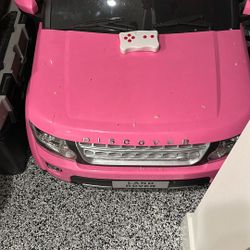Pink Land Rover Car