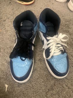 Blue dark blue black and white Jordan’s size 7