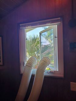 Plexiglass window insert dual hose air conditioner casement