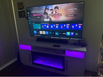 Samsung flat screen & entertainment center
