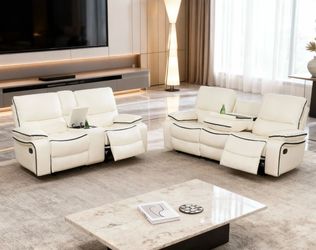 White leather fully reclining couch and love seat