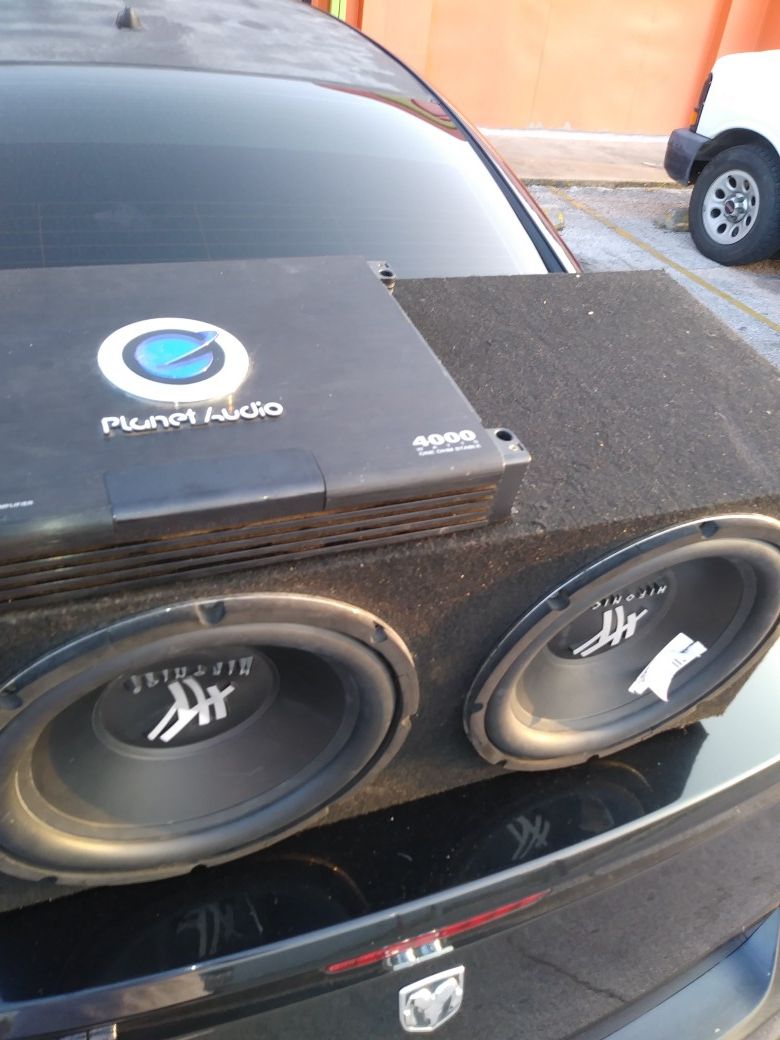 Two 12" Hifonics Subwoofer in box with 4000 watt Planet Audio Amp $250