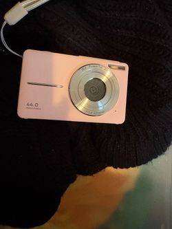 44.0 megapixel pink digital camera