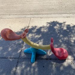 Fisher-Price Happy Whale Seesaw, a teeter-totter designed for children.