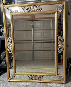 Beautiful Ornate gilded wood decorative mirror with Baroque-inspired ornamentation and float glass