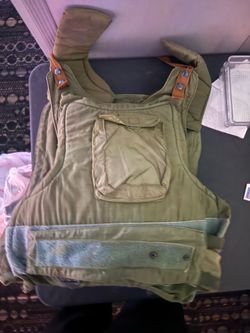 Vintage military vest with plates