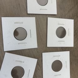 Five Indian Head Pennies. Mixed dates.