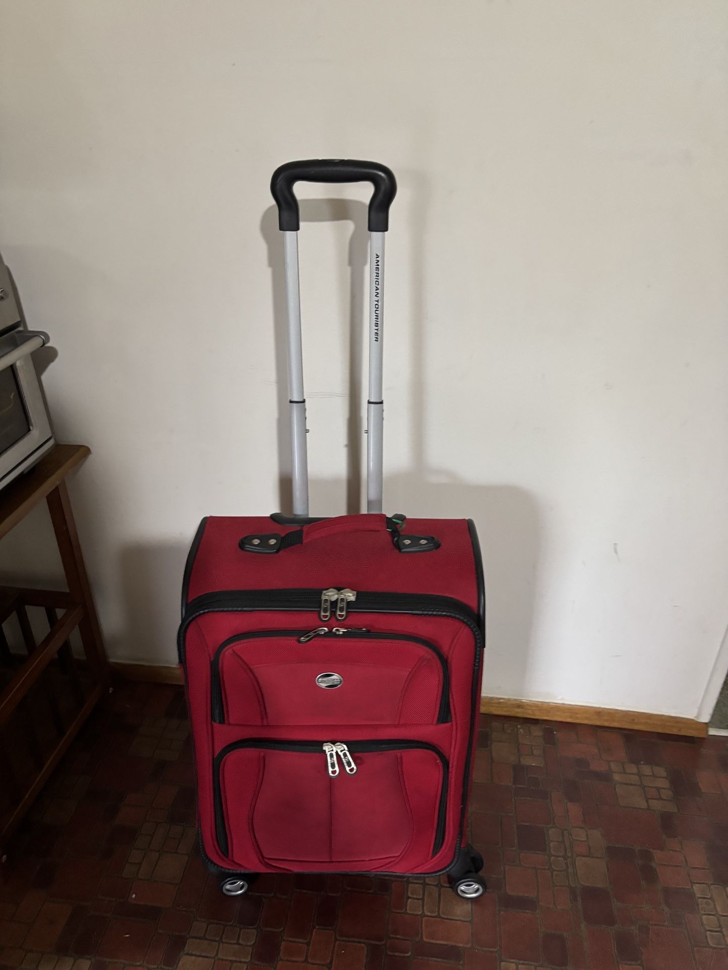 Red suitcase! $25 Carry on