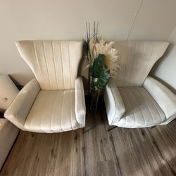 Two Cream Accent Chairs With Ottoman