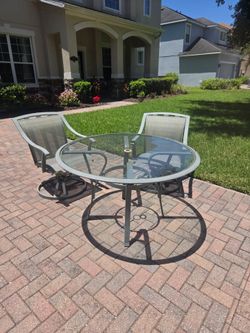 5-Piece Outdoor Patio Set with Glass Top Table and Swivel Chairs