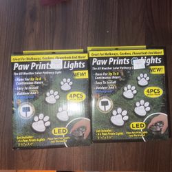 2 Packs Of 4 Paw Print Lights  