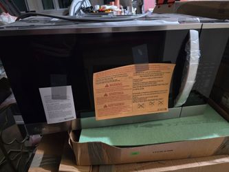Lg over the range microwave brand new out of box