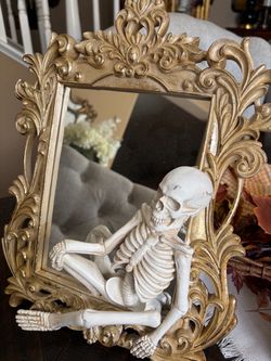 Baroque Gold Mirror with Skeleton Figure Decor