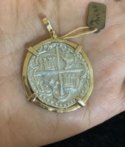 Atocha silver coin pendant in gold bezel