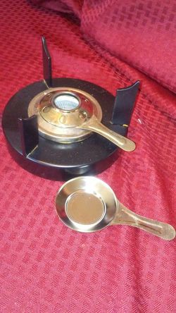 Calentador a alchool con olla