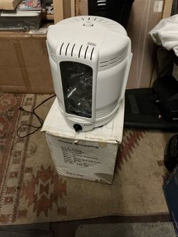 Vertical rotisserie oven