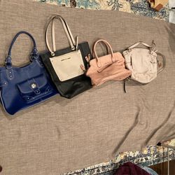4 Designer Purses. Wilson leather, Michael Lots, London Fog, Steve Madden Lot