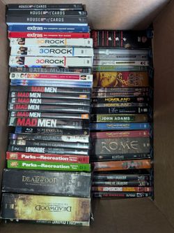 Box full of tv shows and tv series on DVD