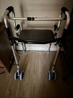 Walker w/foldable seat