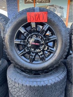 USED WHEELS AND TIRES FROM A. 2500 GMC. 20”.