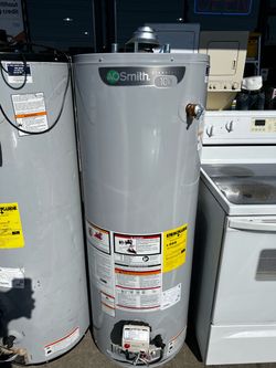 Gas water heater. Ladders. Appliances and more.