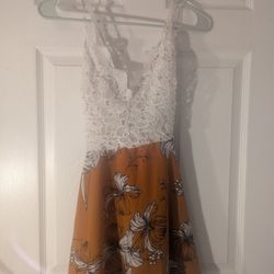 NEVER WORN. Sundress, White top and a Gold or burnt yellow Or Orange. 