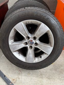 3 Dodge rims and tires