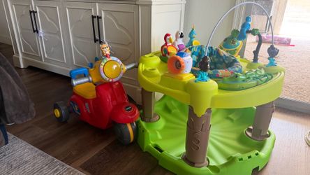 Kids Ride-On Toy and Activity Center/Exersaucer