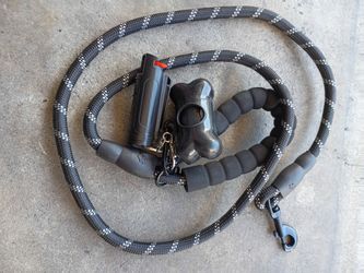 Dog leash with poop bag holder and pepper spray