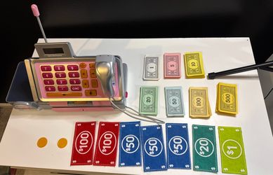 Toy cash register and fake money