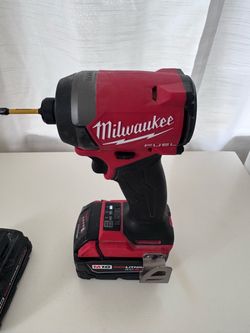 Milwaukee M18 impact driver brand new with batteries.