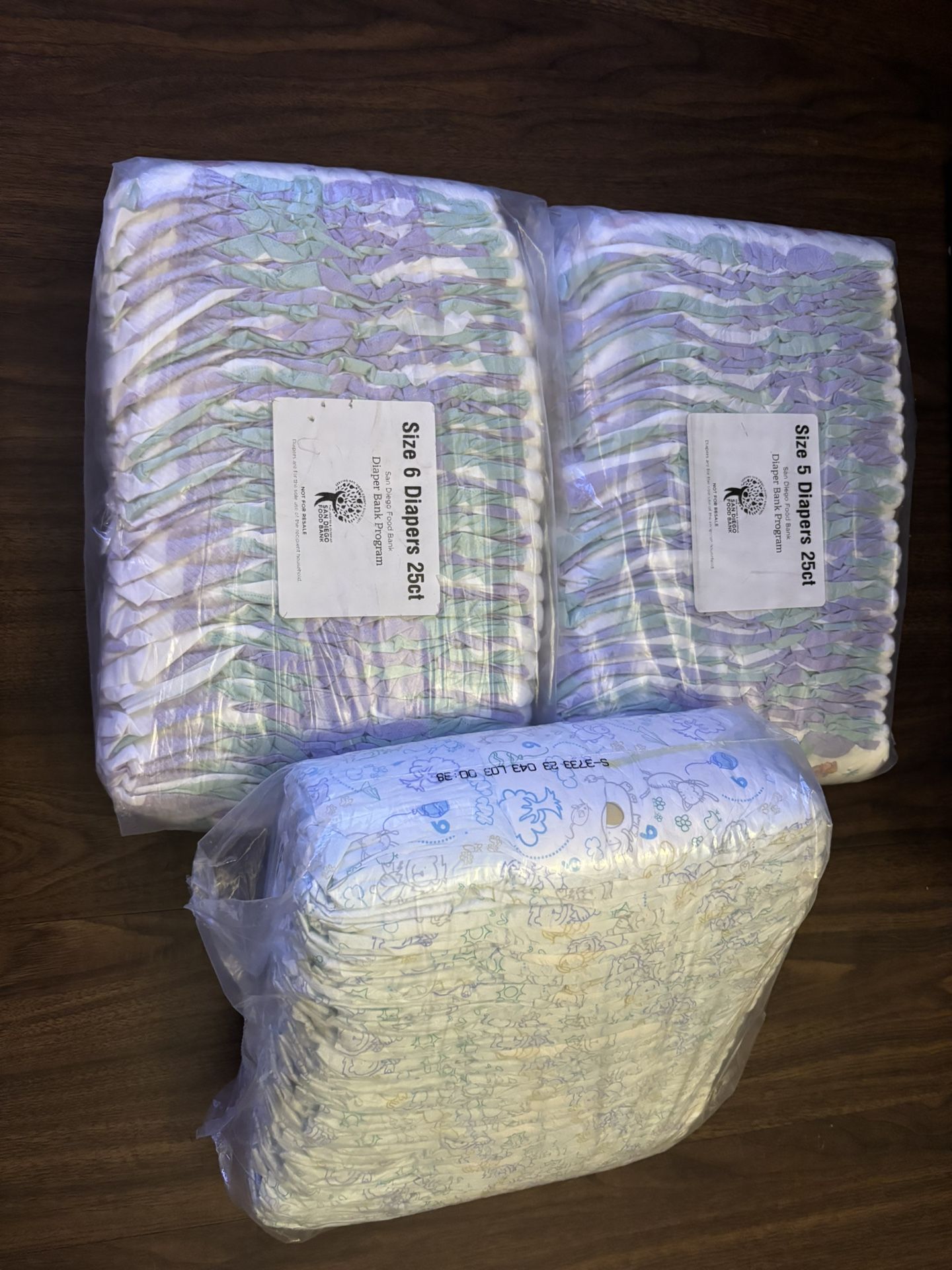 1 Pack Size 5, 2 Packs Size 6 Diapers 