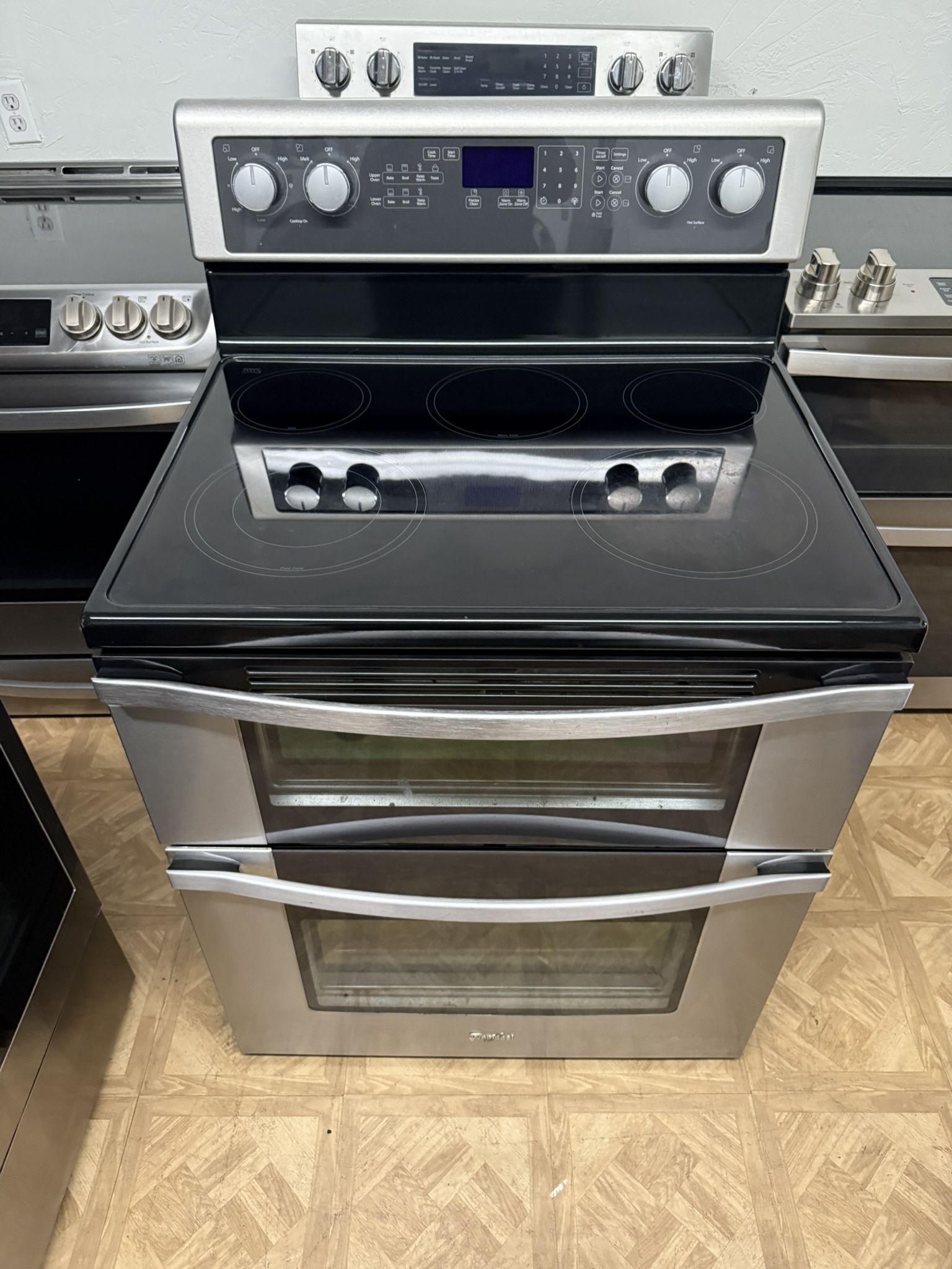 WHIRLPOOL DOUBLE OVEN GLASS TOP STOVE.
