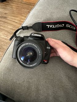 EOS T1i rebel w/ kit and zoom lens