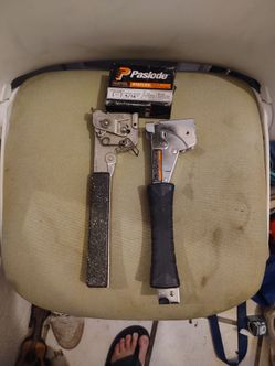 Two roofing staplers