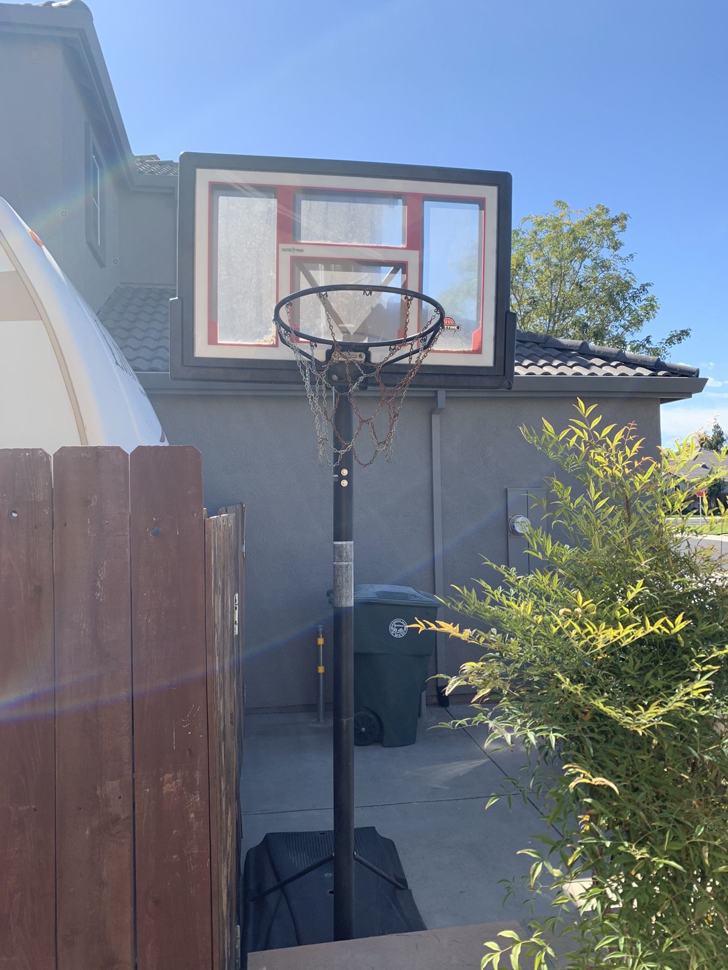 48in Lifetime Shatterproof Basketball Hoop. Brand new adjustable lever- works great. Also comes with additional net.