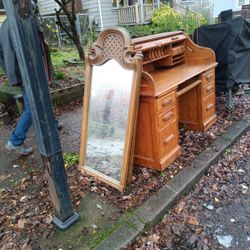 This is a Drexel Corinthian mirror in cherry wood