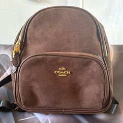 Brown suede coach backpack