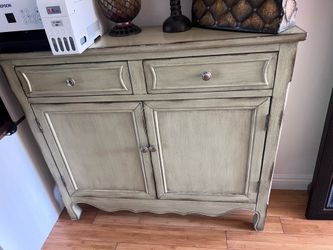 Distressed green sage accent cabinet