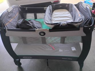 Playpen with changing table