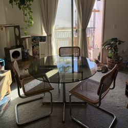 Mid-Century Modern Brown Glass Top Table & Rattan Chairs
